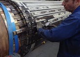 sulzer engineer repairing generator