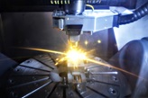 The laser metal deposition head in action